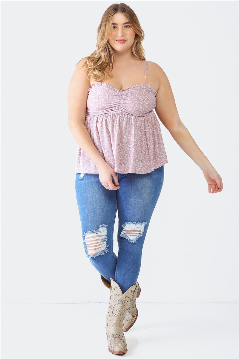 A woman stands facing the camera wearing a Zenobia Plus Size Frill Smocked Floral Sweetheart Neck Cami with dark jeans, against a plain background.