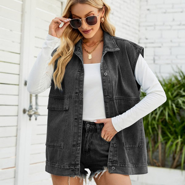 A woman in a Women Denim Jacket, white cotton long-sleeve shirt, shorts, knee-high boots, sunglasses, and a black hat is sitting on a bench.