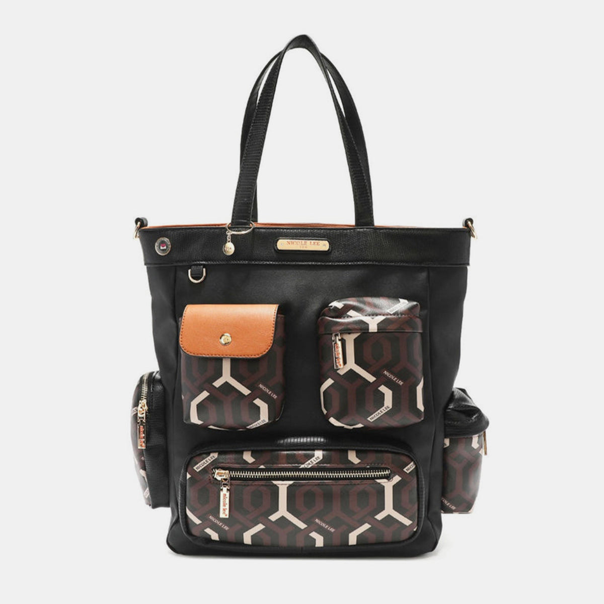 Introducing the Nicole Lee USA Geometric Pattern Tote Bag, a spacious accessory made from vegan leather with a striking black body, adorned with brown and white geometric patterned pockets, complemented by a brown flap pocket and black handles.