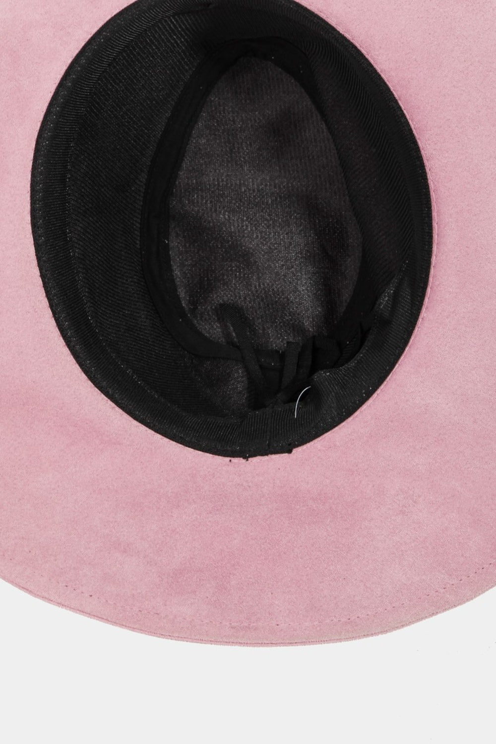 The stylish Fame Braided Faux Suede Hat in a fashionable pink color features a wide brim with a braided band and bow detail, and is displayed on a plain background.