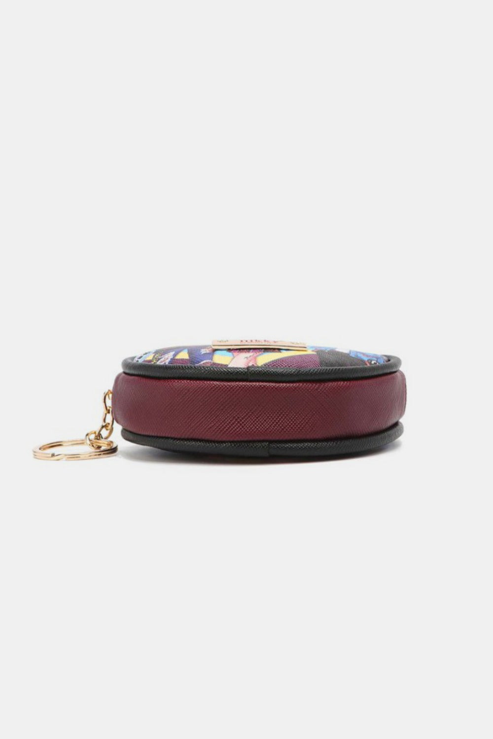 The Nicole Lee USA Keychain Round Coin Purse features a vibrant cartoon graphic on the front with three animated characters, crafted from eco-leather material. This stylish and functional accessory includes a zipper closure and a keyring attachment, making it perfect as a keychain round coin purse.