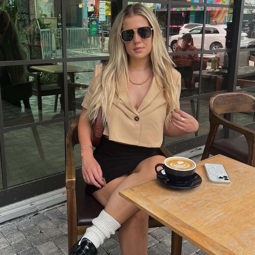 A pair of Goldie sunglasses with brown lenses.