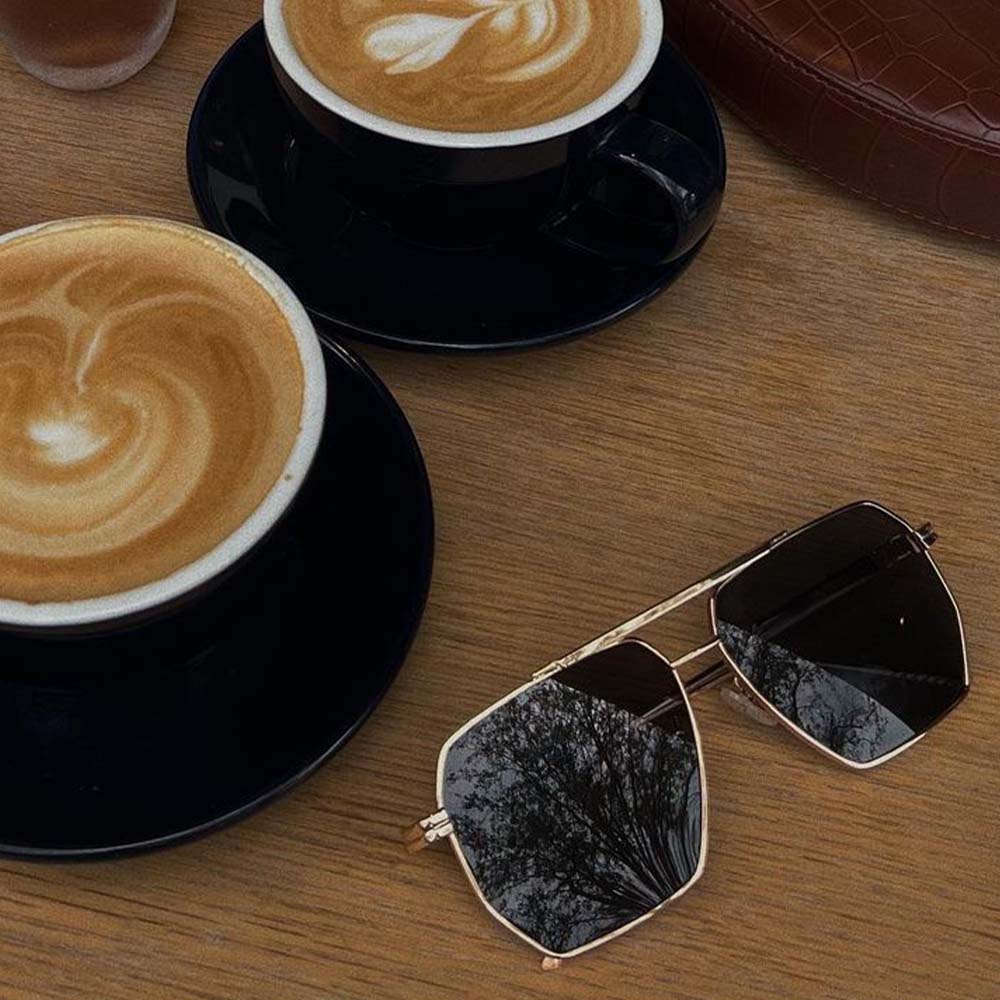 A pair of Goldie sunglasses with brown lenses.