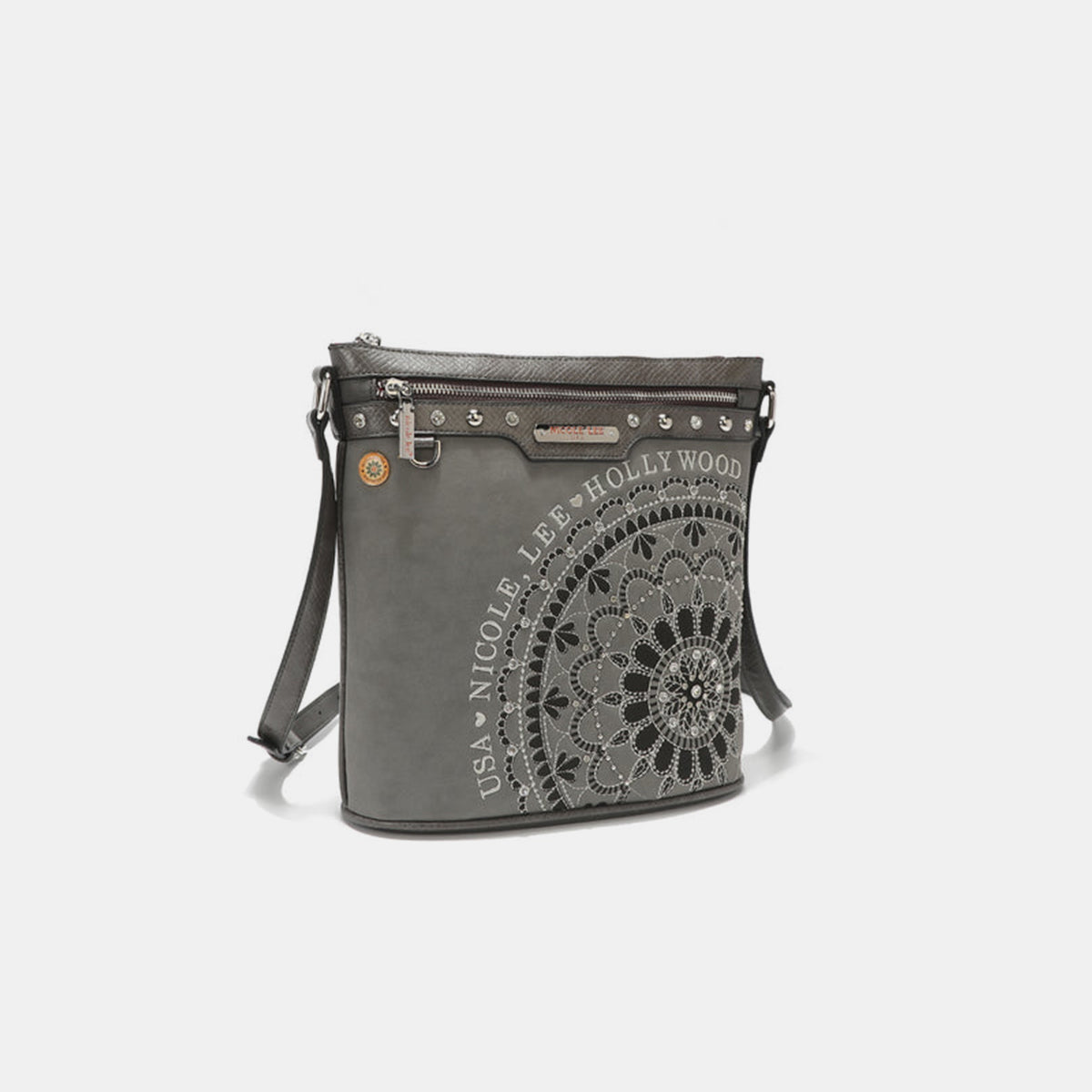 The Nicole Lee USA Metallic Stitching Embroidery Inlaid Rhinestone Crossbody Bag is a brown vegan leather accessory adorned with intricate white designs and text reading "Nicole Lee Hollywood USA" on the front. It features diamond rhinestones, multiple zippered compartments, and an adjustable strap.