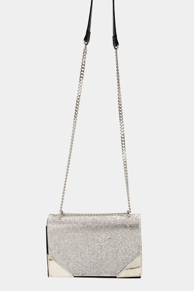 The Fame Rhinestone Studded Rectangle Crossbody Bag is a glamorous pink shoulder bag featuring a gold chain strap and metal corners, making it the perfect medium PU bag to add a touch of elegance to any outfit.