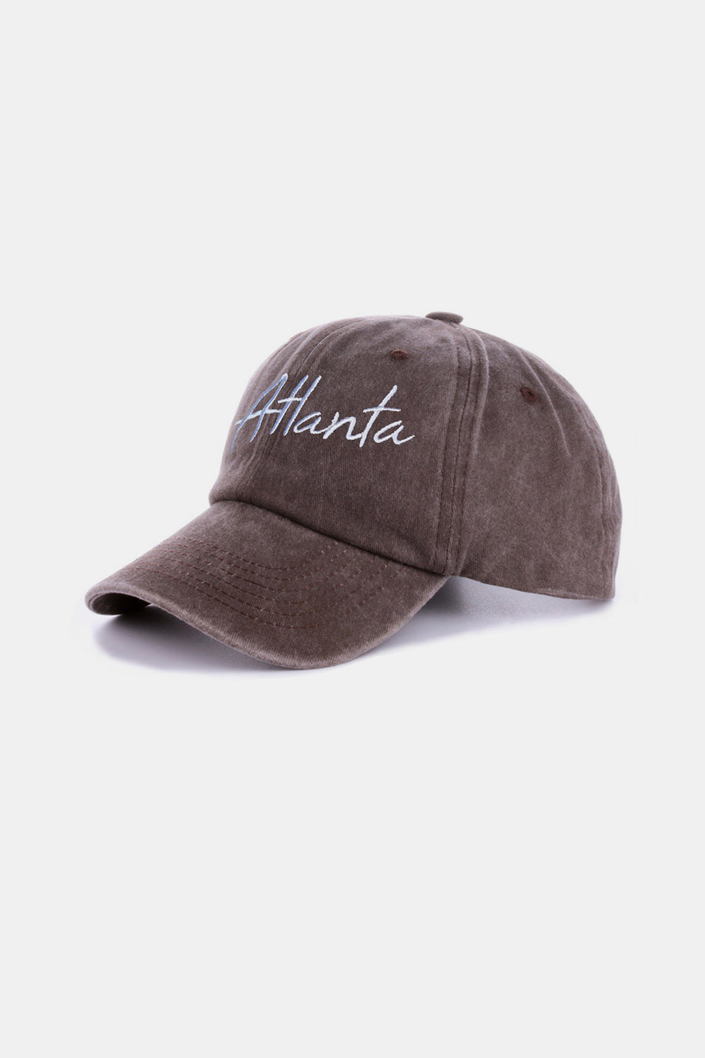 The Zenana Washed ATLANTA Embroidered Baseball Cap is a vintage style accessory, showcasing the word "Atlanta" embroidered in white on its blue denim front.