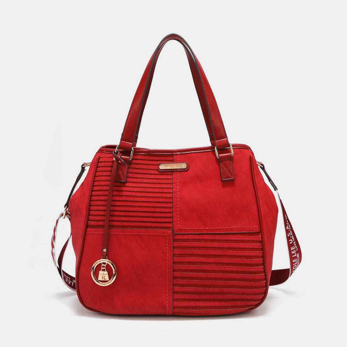 Nicole Lee USA's Scallop Stitched Tote Bag in red is made from vegan leather, showcasing textured stripes and scallop-stitched details, and includes a gold circular charm on one handle.