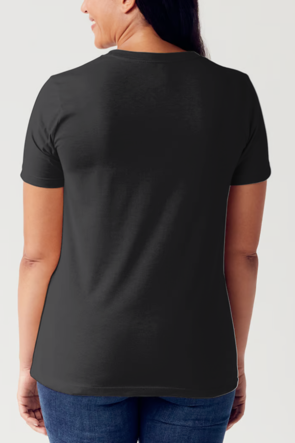 A person is wearing a Simply Love Full Size Slogan Graphic Short Sleeve Tubular T-Shirt, featuring a minimalist design of two hands reaching for each other. The text reads: "See the good in yourself and in others," delivering a positive message to all who see it.