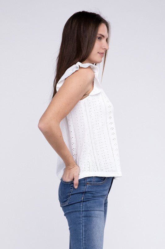 A person wearing a white Ruffle Sleeve V Neck Top and blue jeans, posing against a plain background.