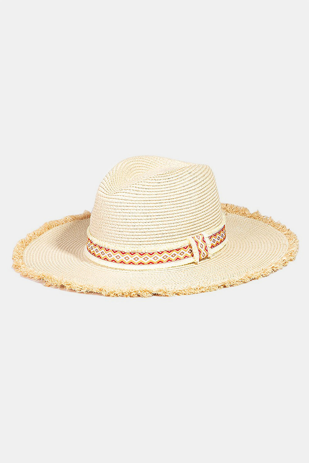 The Fame Geometric Raw Hem Hat is a stylish wide-brimmed straw hat, adorned with a red and beige geometric patterned band, making it the perfect fashionable accessory.