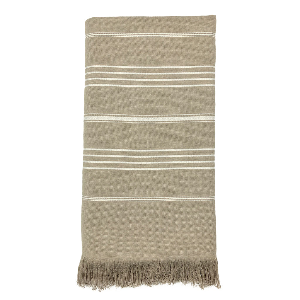 The Classic Terry Turkish Towel is a handmade white towel featuring horizontal gray stripes and fringed edges, ideal for enhancing the elegance of your bath collection.