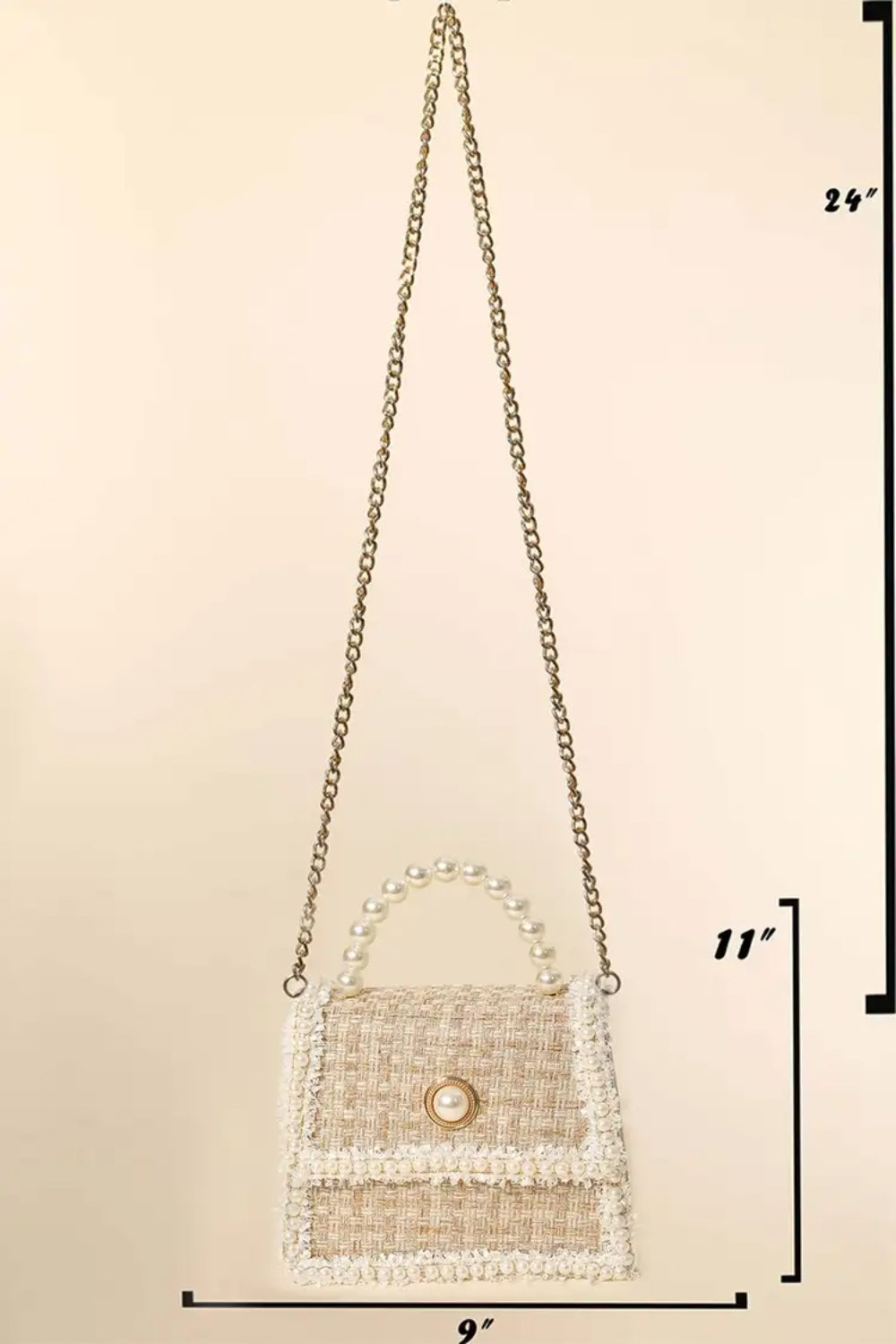 The Fame Pearly Trim Woven Handbag is a compact, rectangular accessory that blends exquisite woven craftsmanship with an elegant design. Its pearl handle and trim accentuate the textured fabric, and a pearl button closure provides the perfect finishing detail.