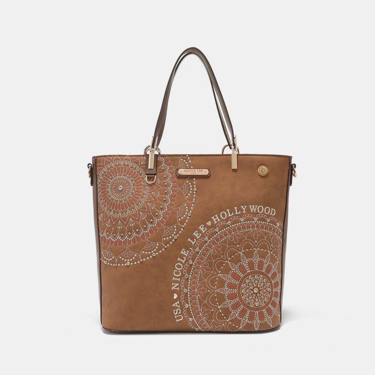 The Nicole Lee USA Metallic Stitching Embroidery Inlaid Rhinestone Tote Bag is a medium shopper in brown, crafted from vegan leather with intricate white mandala patterns and text that reads "USA Nicole Lee Hollywood." It features two shoulder straps, diamond rhinestones, and a decorative emblem on the front.