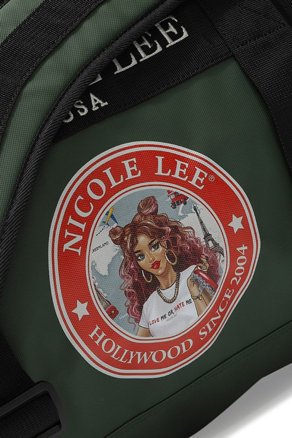 The Nicole Lee USA Large Duffel Bag is a lightweight, green bag with black straps and handles, featuring the "Nicole Lee USA" logo in the center and offering versatile carrying options.