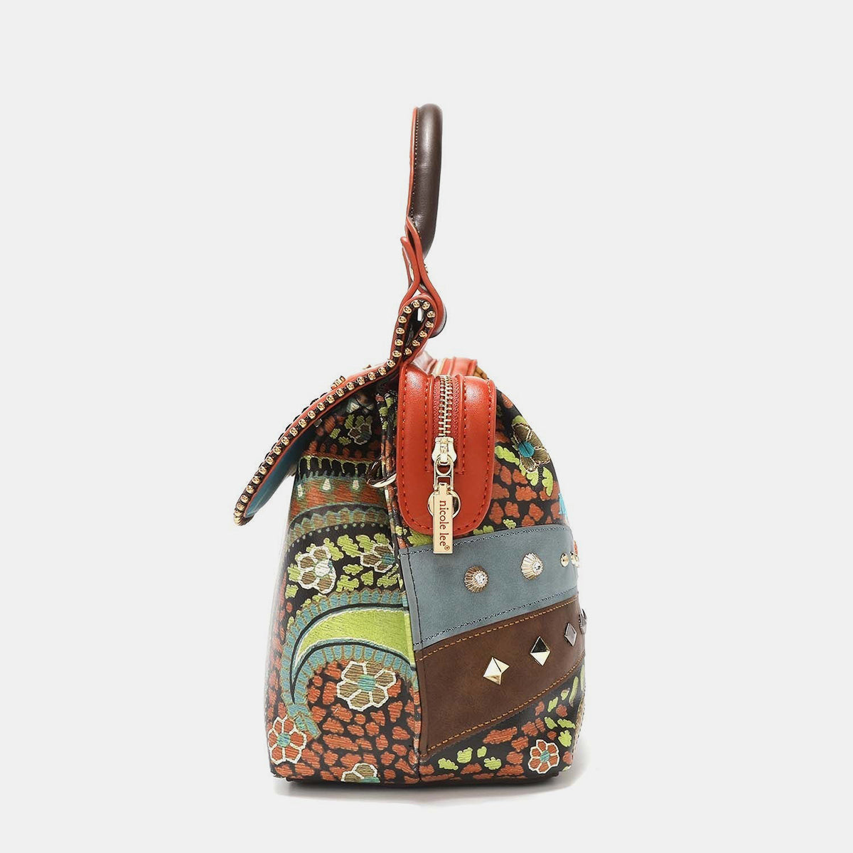 Nicole Lee USA's Front Stitch Detail Inlaid Stud Handbag is a lively vegan leather piece featuring brown handles, a blend of floral and geometric patterns, inlaid studs, and an ornamental charm.