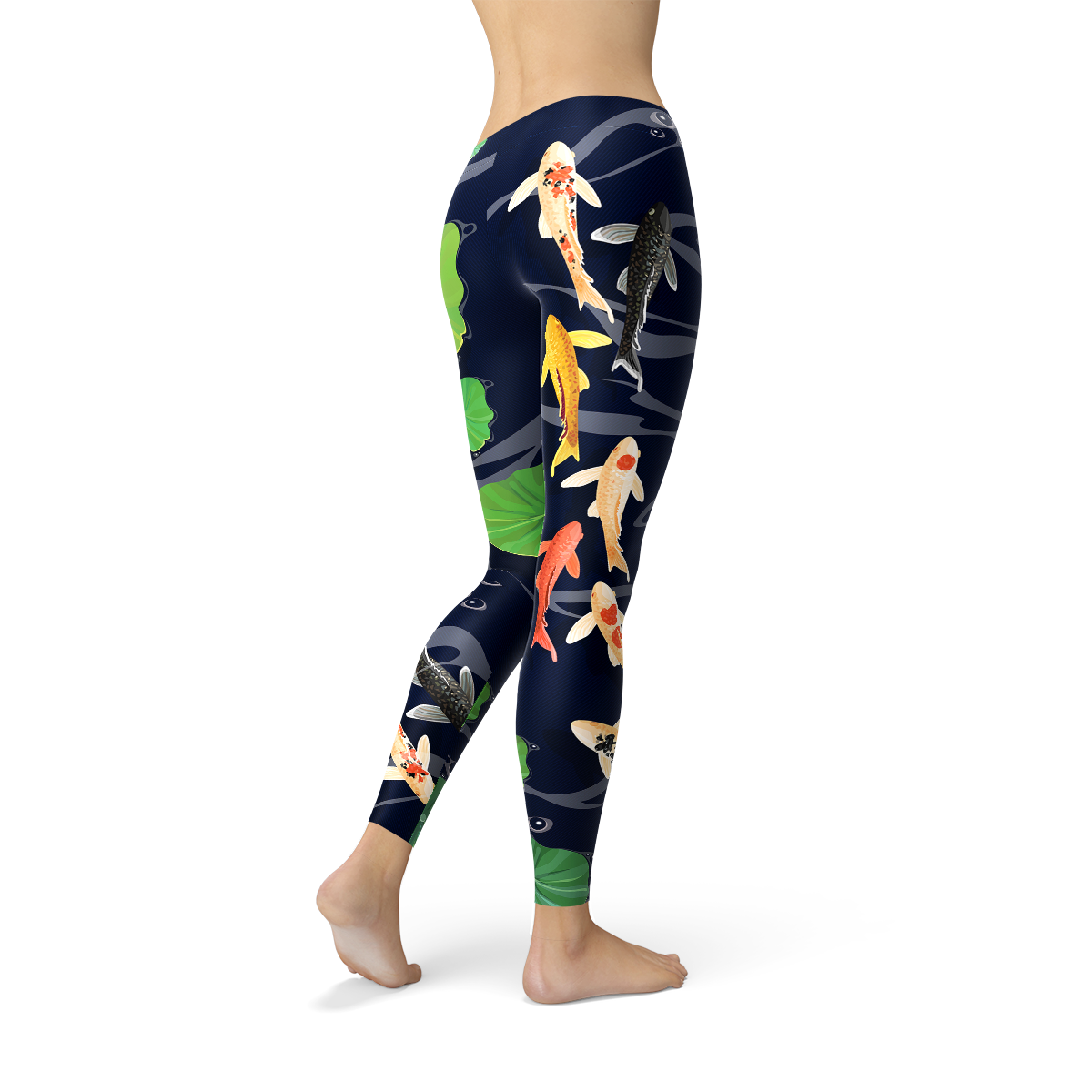 A person is modeling the Womens Koi Fish in Pond Leggings, which feature a koi fish and lily pad pattern on a dark background, crafted from smooth microfiber yarn with four-way stretch for ultimate comfort and flexibility.