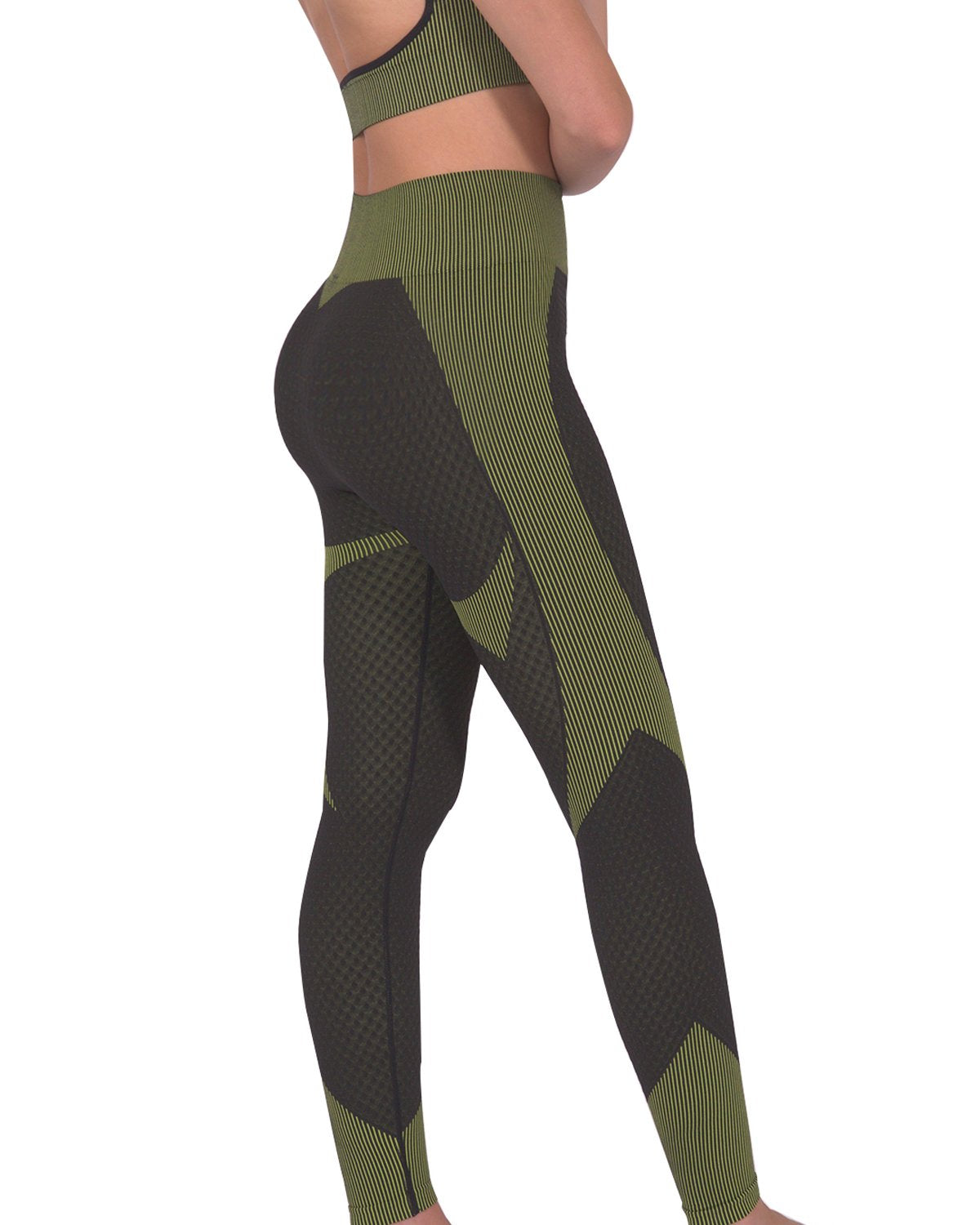 A person is dressed in a green and black athletic outfit, featuring the Trois Two Set. This set includes a sleeveless top paired with high-waisted Trois Seamless Legging - Black with Green, made from high-compression bodycon fabric with a textured pattern. The person's face is not visible in the image.