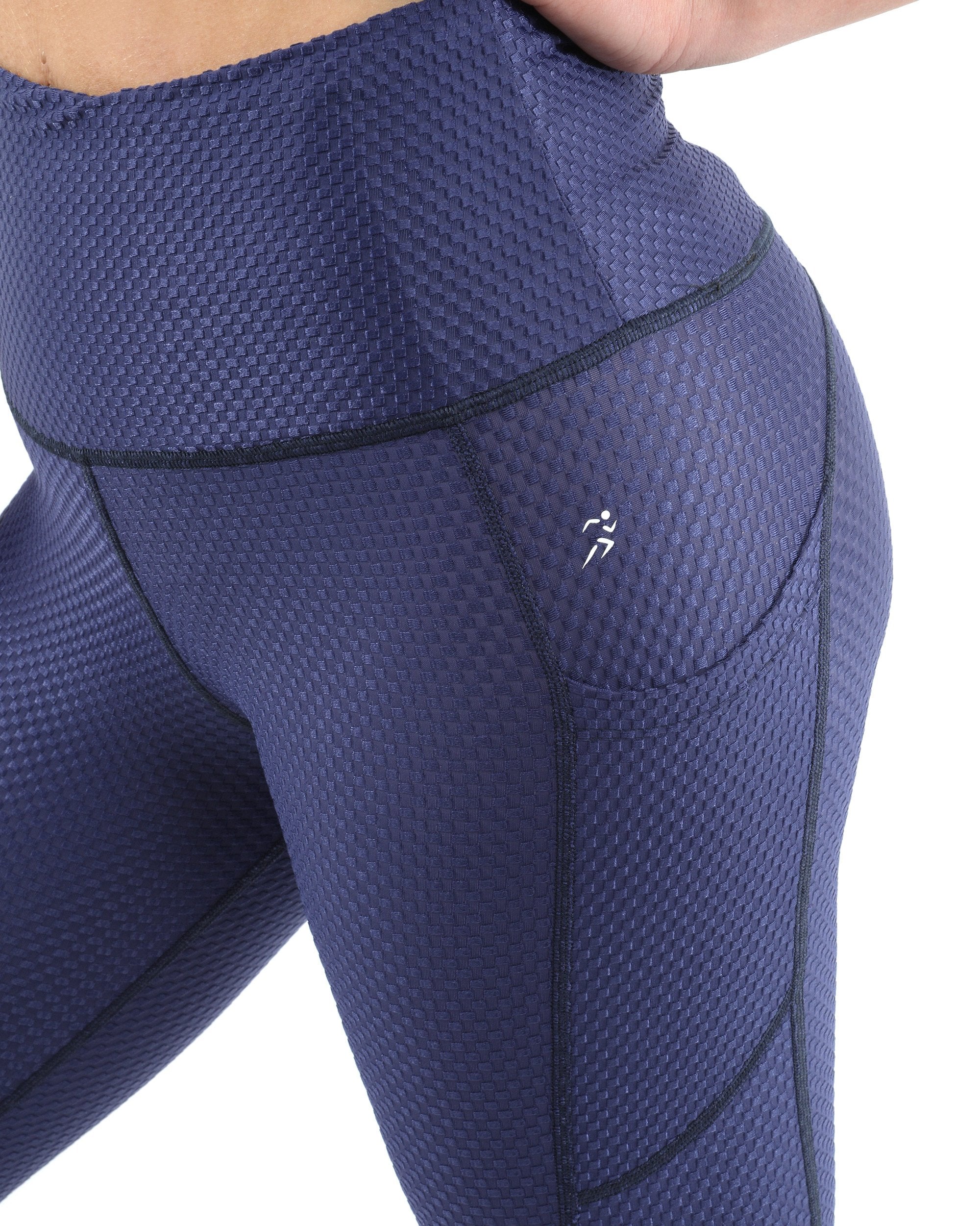 Person wearing SALE! 50% OFF! Venice Activewear Leggings - Navy [MADE IN ITALY] with a sculpted compression fit and dark blue textured fabric, paired with black sneakers, standing with hands partially visible at waist level.