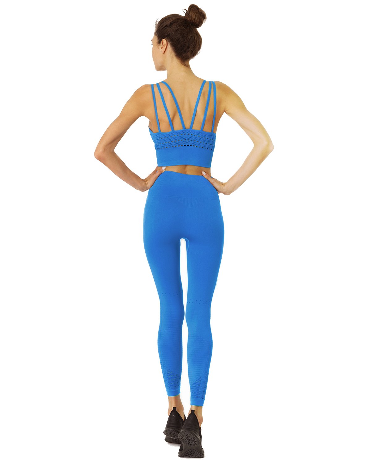 Person wearing the Mesh Seamless Legging with Ribbing Detail - Blue, standing against a white background. Only the lower body is visible.