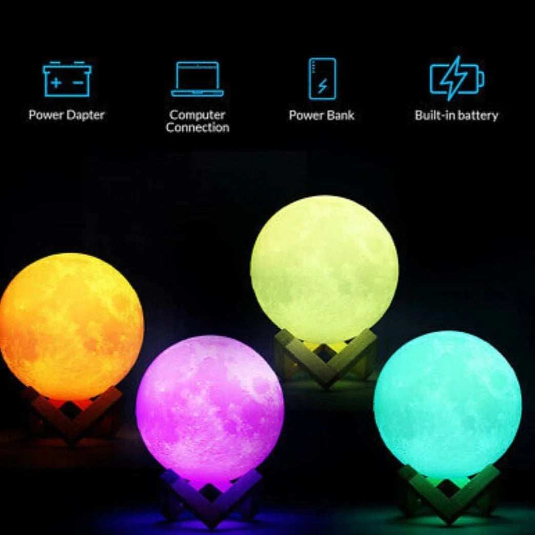 A Glowing Moon Lamp with stand with different colored balls and a remote control.