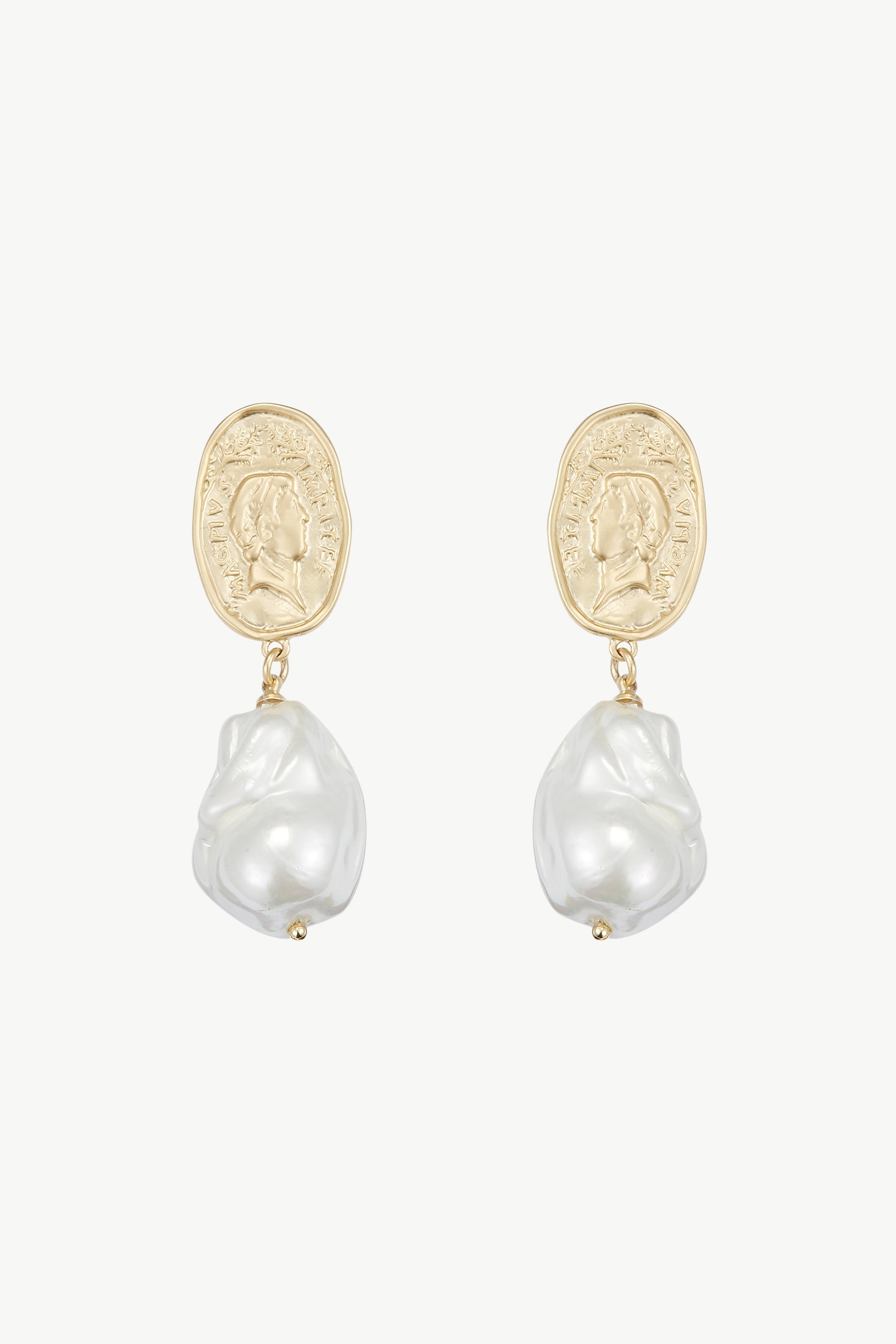 A pair of earrings featuring Matted Gold Sculpted Oversized Baroque Pearl Drop Earrings.