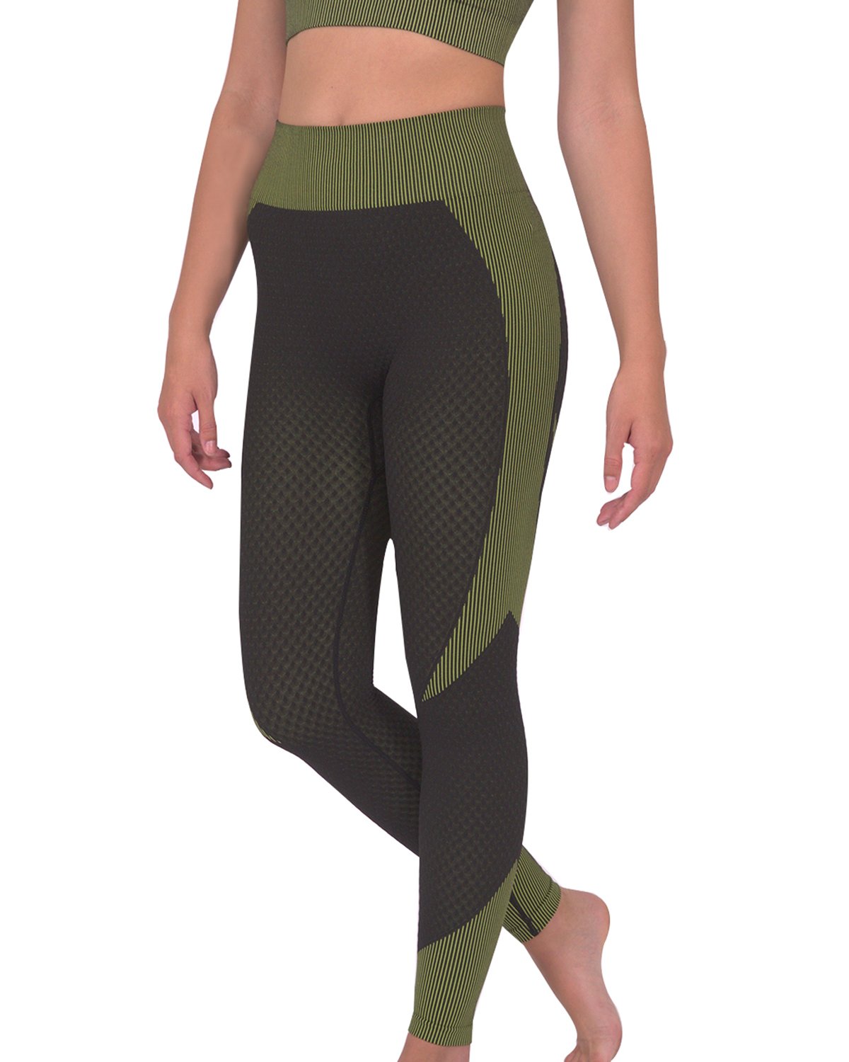 A person is dressed in a green and black athletic outfit, featuring the Trois Two Set. This set includes a sleeveless top paired with high-waisted Trois Seamless Legging - Black with Green, made from high-compression bodycon fabric with a textured pattern. The person's face is not visible in the image.