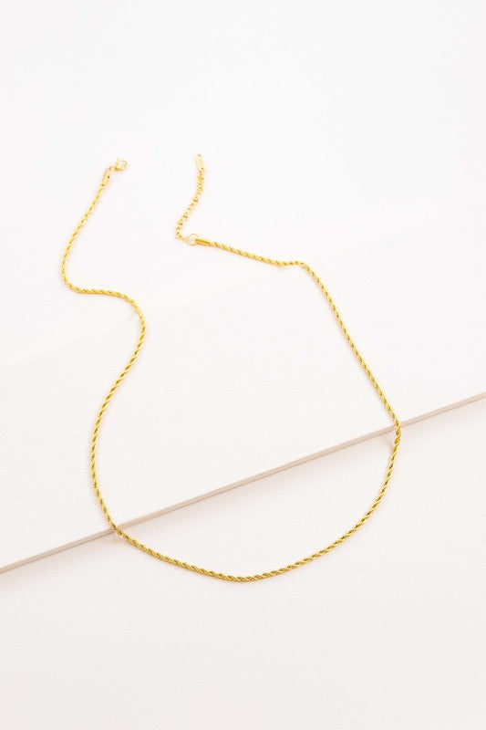 Twist Around Necklace on a white background.