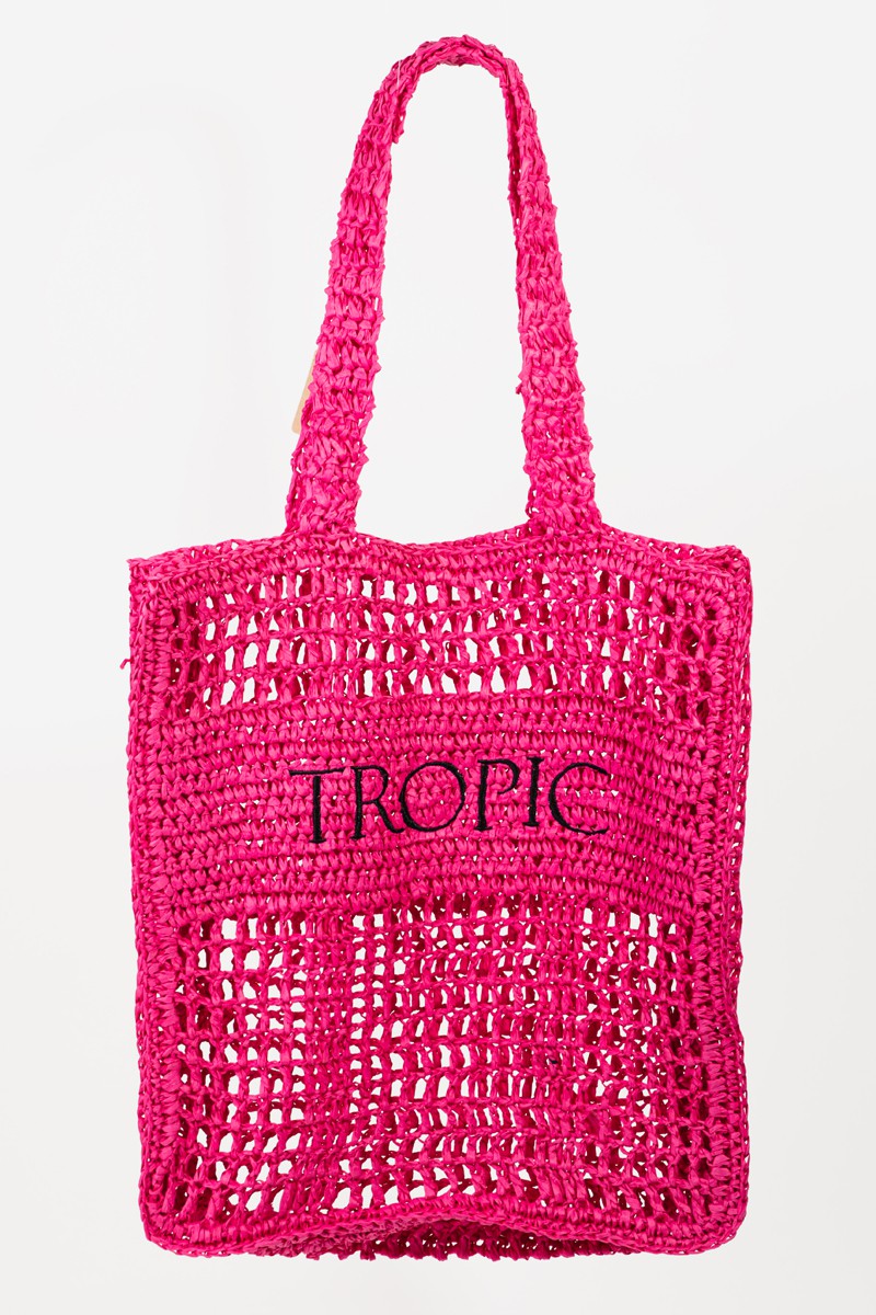 Introducing the Fame Cutout Letter Graphic Handbag, a trendy accessory that showcases a modern design with the word "TROPIC" in bold black lettering on its pink woven surface.