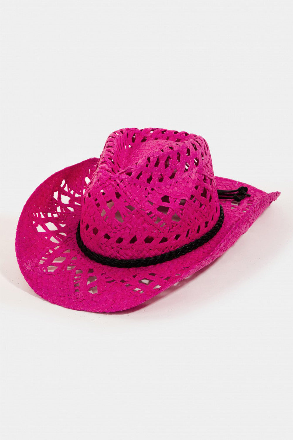 The Fame Cutout Wide Brim Hat is a stylish accessory featuring a pink woven design, complete with a black band and textured pattern. Its wide brim provides excellent sun protection, making it the perfect combination of style and function.