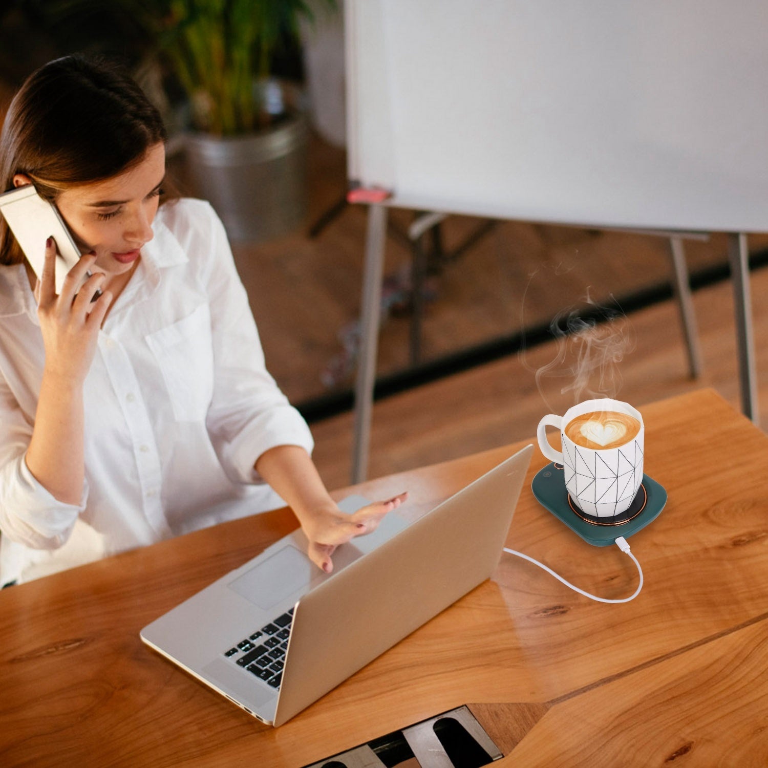 A pink Electric Coffee Mug Warmer for Desk Auto Shut off USB Tea Milk Beverage Cup 3 Temperature Setting with a digital display showing the temperature at 55 degrees Celsius and auto off feature.