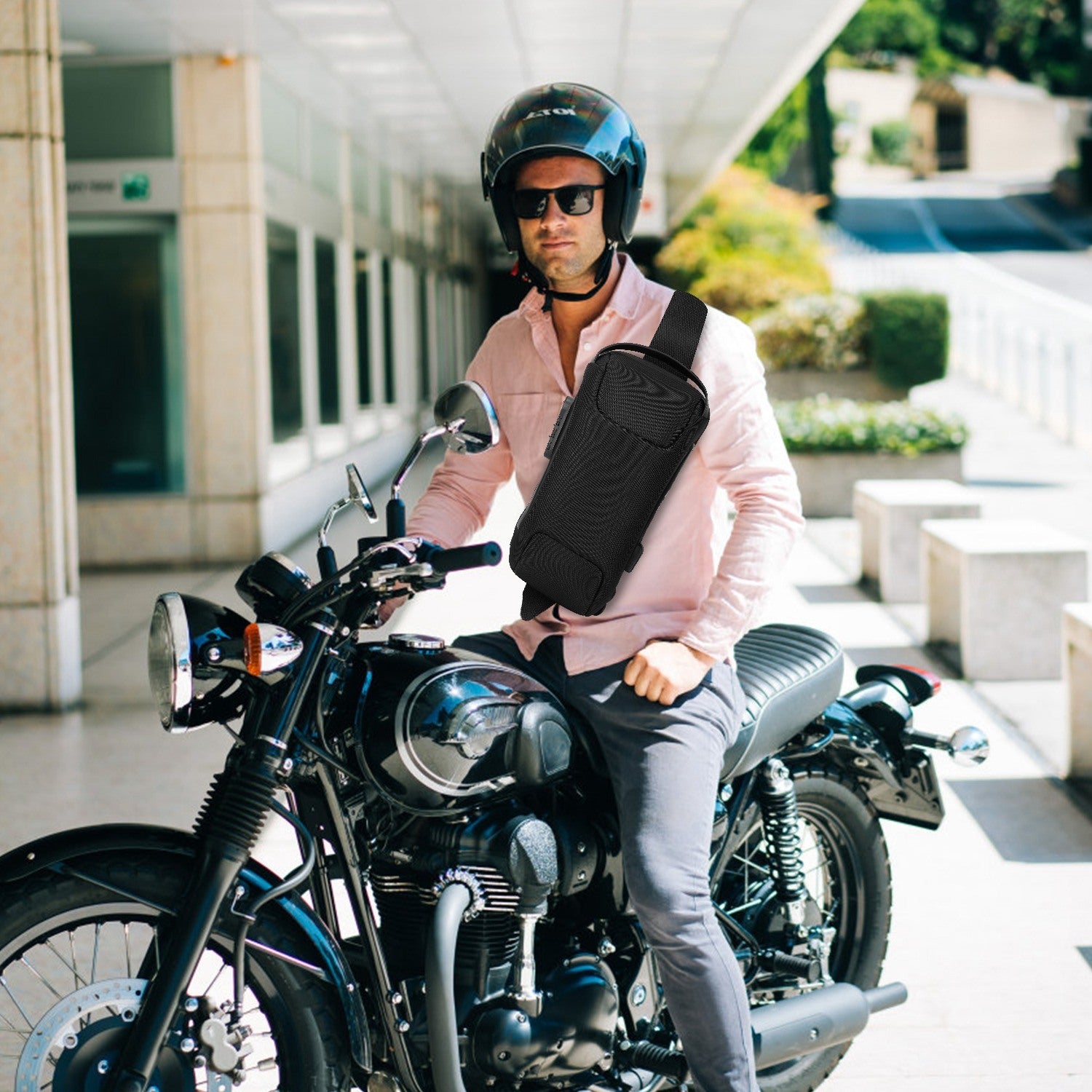 A Men's Sling Backpack Waterproof Anti-theft Shoulder Crossbody Chest Bag Messenger Sling Bag Daypack with USB Charging Port, featuring a smooth outer surface and an adjustable shoulder strap, isolated on a white background.