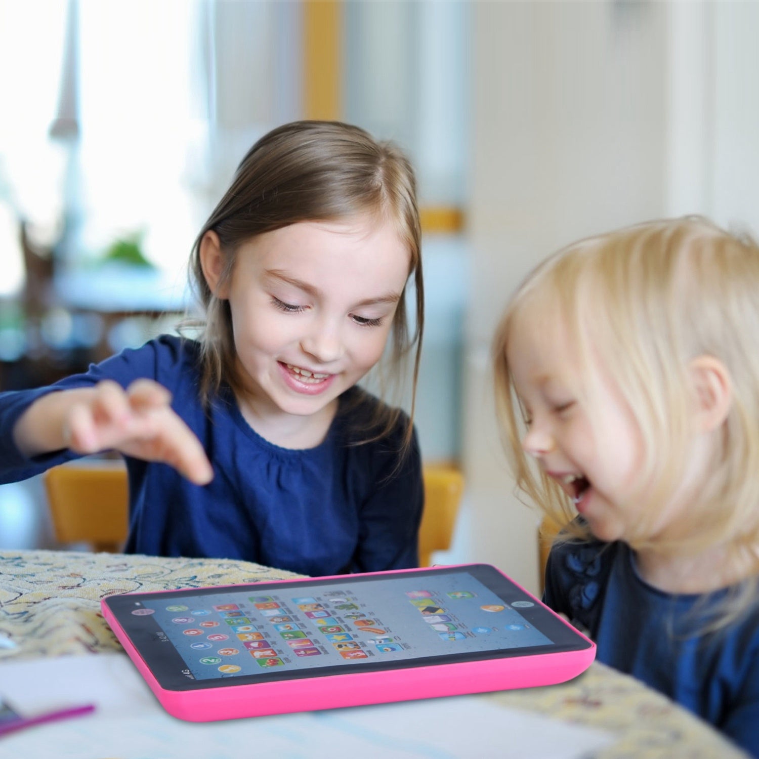 A young girl smiles while leaning on her arm next to an advertisement for a Baby Learning Tablet Educational Mini Pads Toys Touch Learn Toddler Tablet For ABC Numbers Words Gift, highlighting apps for kids aged 1-6.
