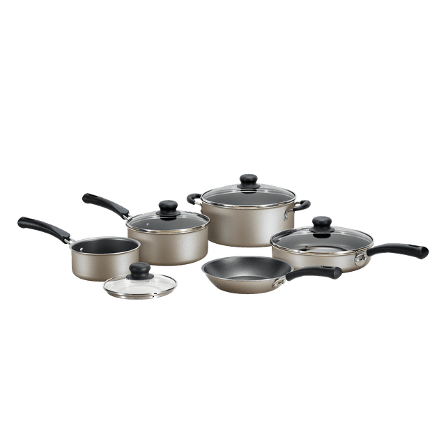 A set of new 9-Piece Non-Stick Cookware Set including two pots, a saucepan, and two frying pans, all with tempered glass lids and black handles, arranged on a white background.