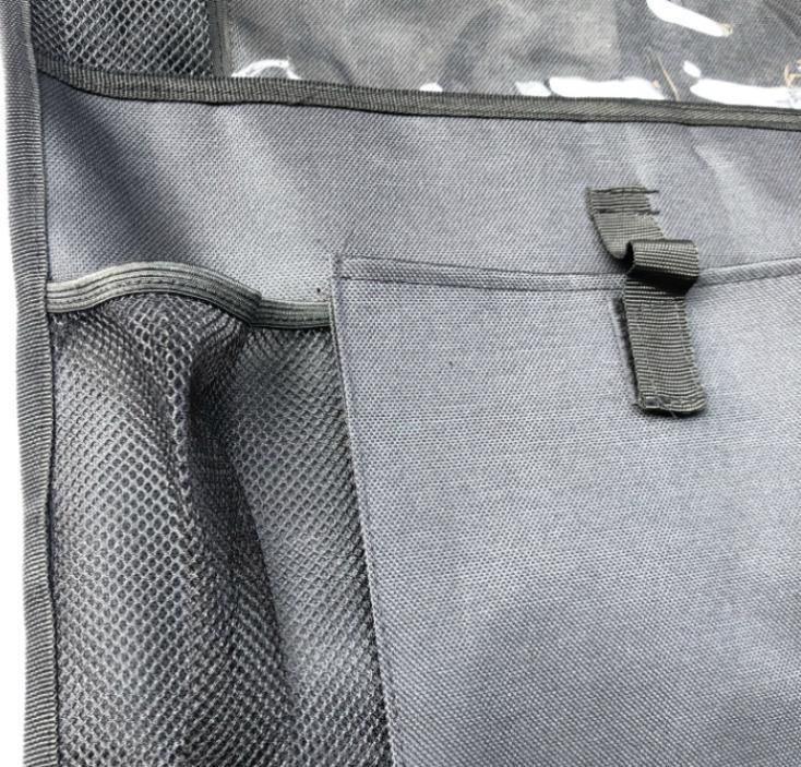 Two Backseat Car Organizers - 2PK, equipped with tablet holders and filled with items like bottles, snacks, and electronics, installed in a vehicle.