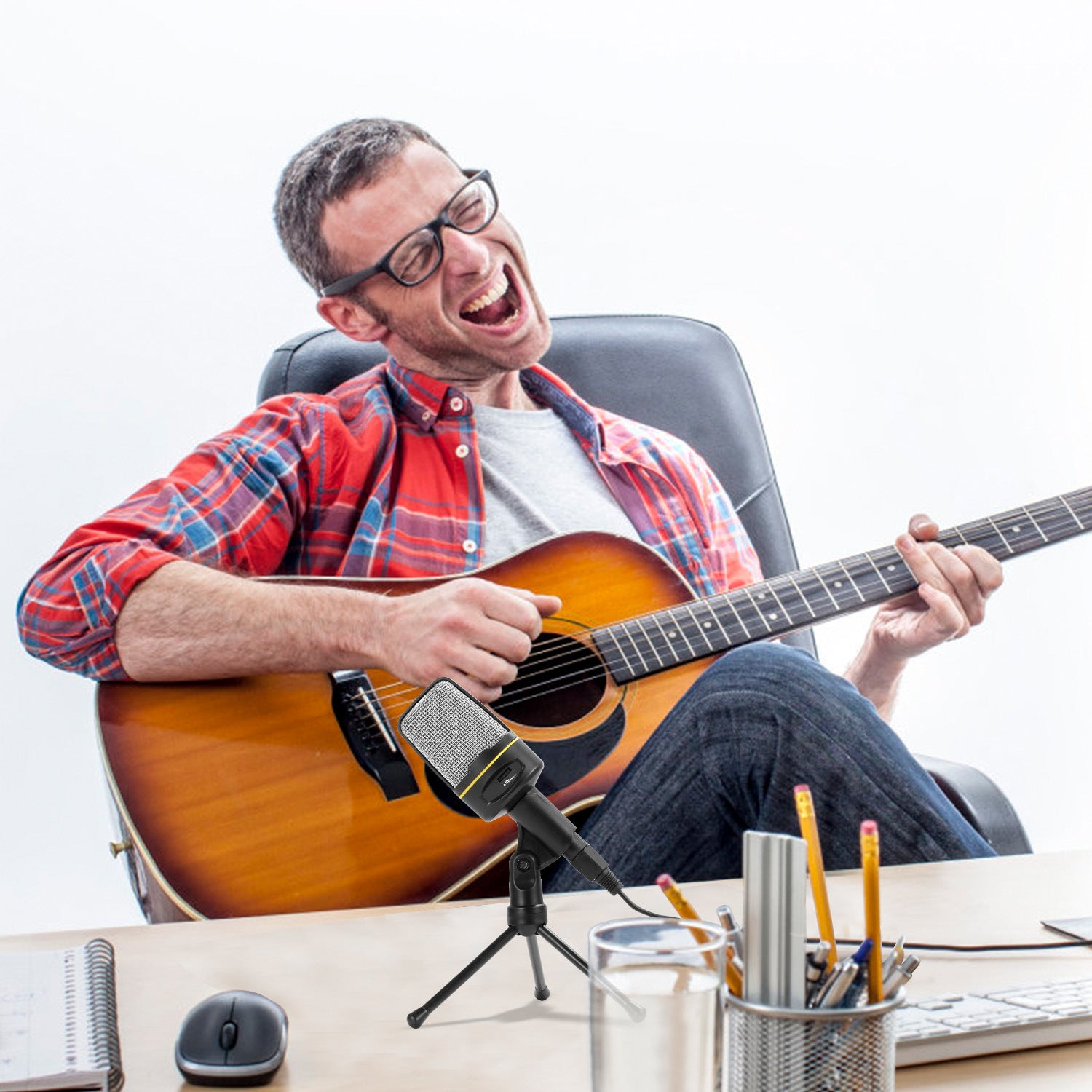 An Pro Condenser Microphone with Tripod Stand Audio Studio Recording Desktop Mic Flexible Mic on a small tripod stand, isolated on a white background.