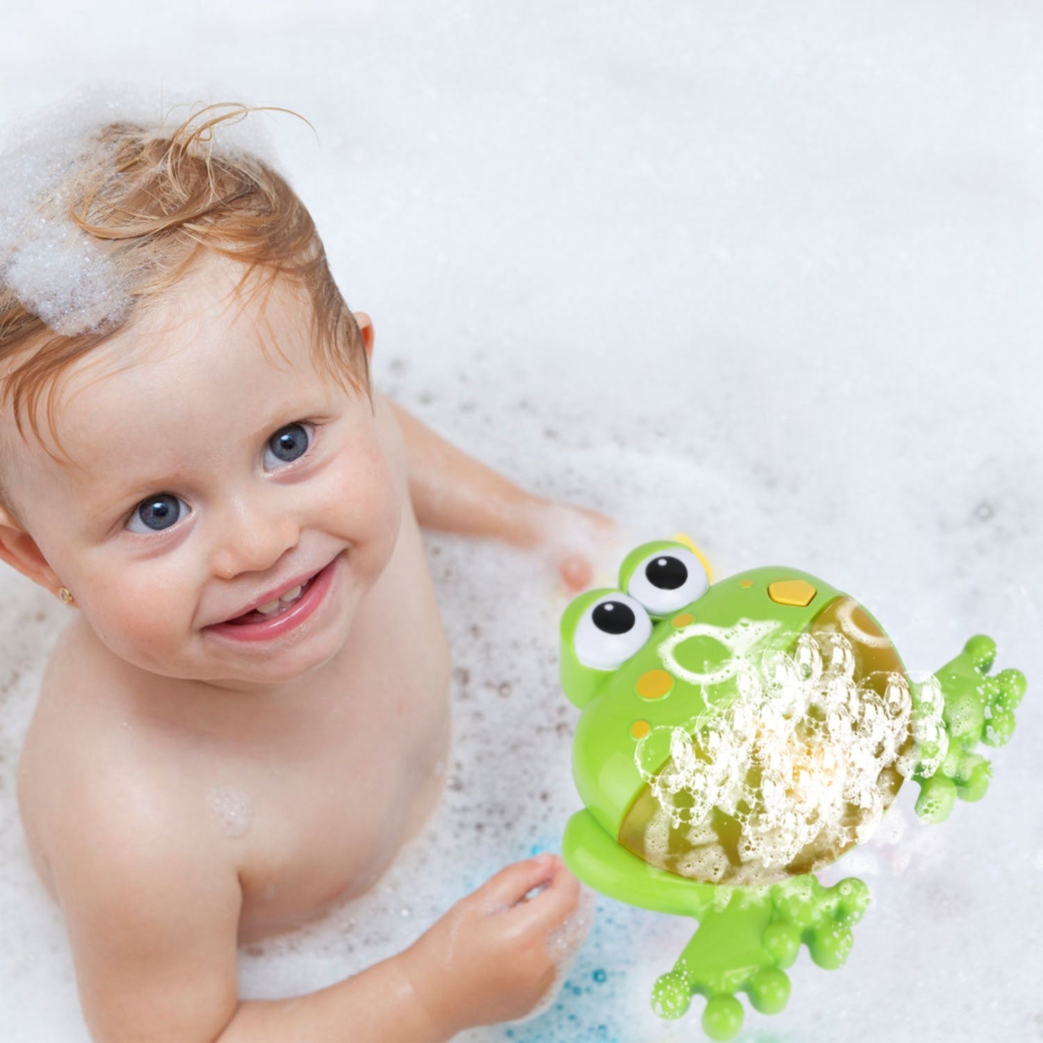 A whimsical Frog Musical Bubble Bath Maker releasing soap foam, isolated on a white background.