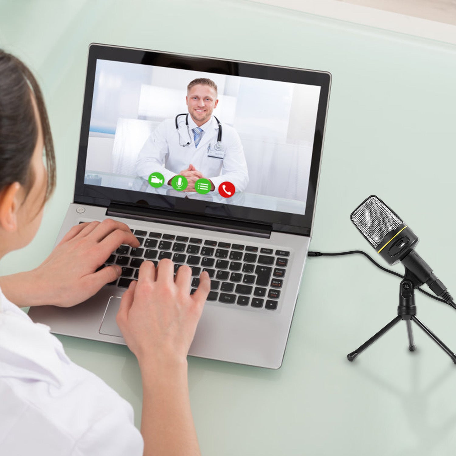 An Pro Condenser Microphone with Tripod Stand Audio Studio Recording Desktop Mic Flexible Mic on a small tripod stand, isolated on a white background.