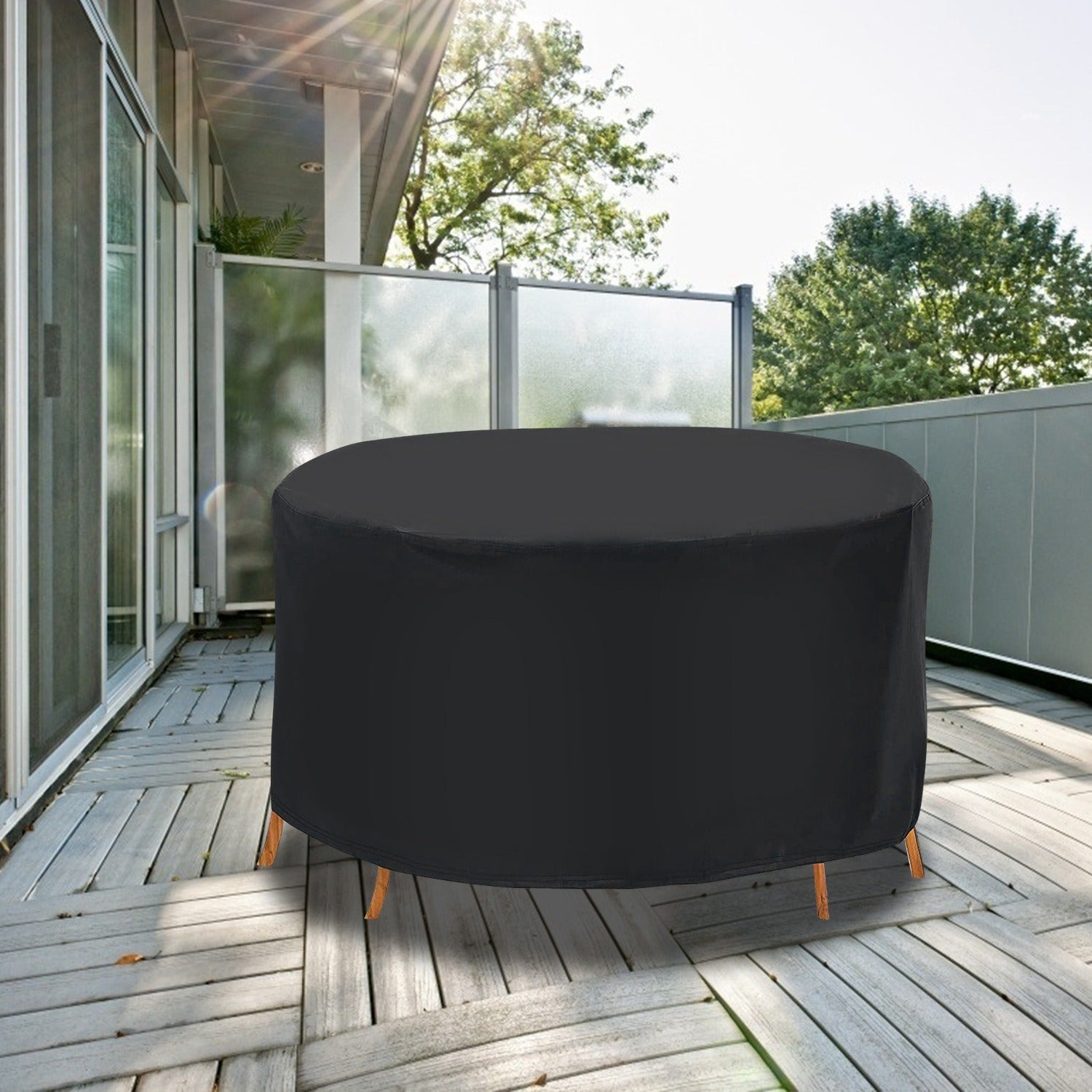 A Circular Table Cover UV Water Resistant Outdoor Furniture Protector fitting over a round table, with the table's legs visible.