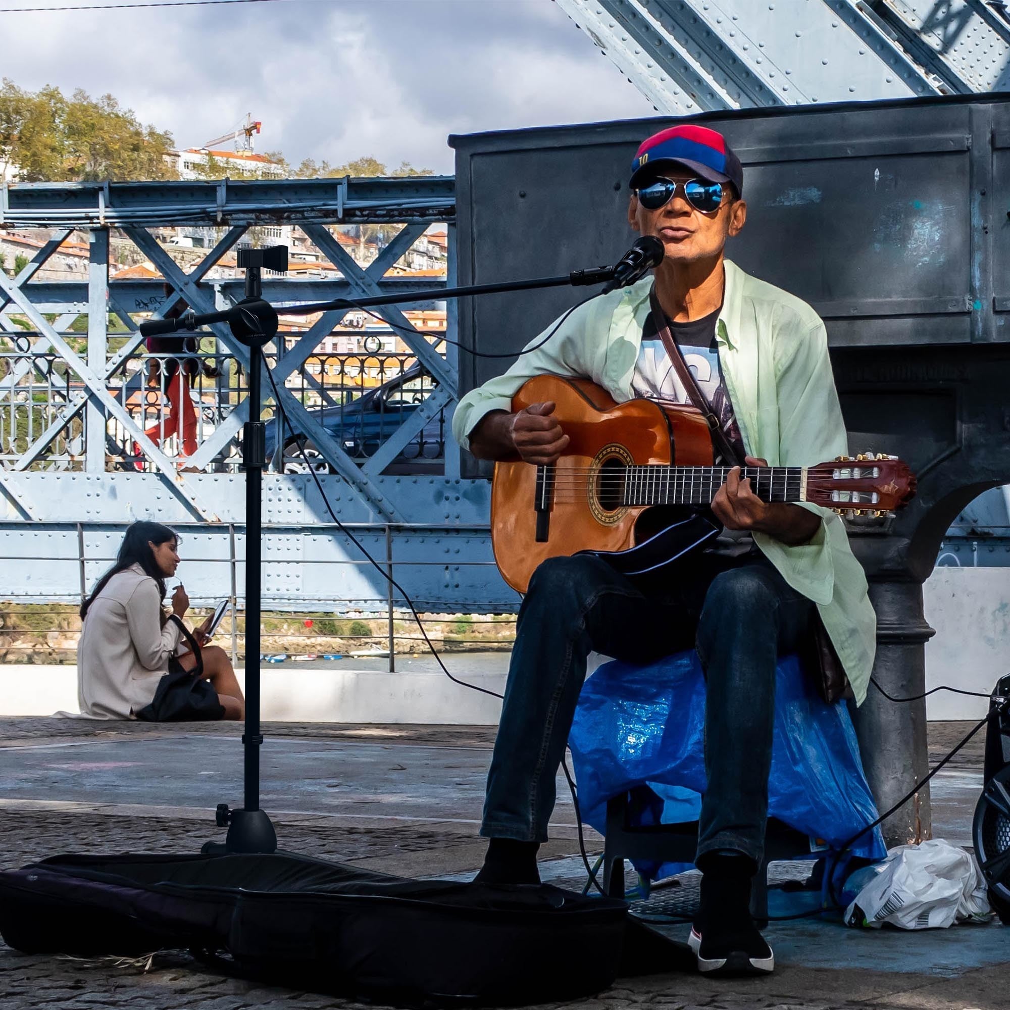 Black Mic Stand w/ Boom Arm 2mic Black with adjustable height and a tripod base isolated on a white background.