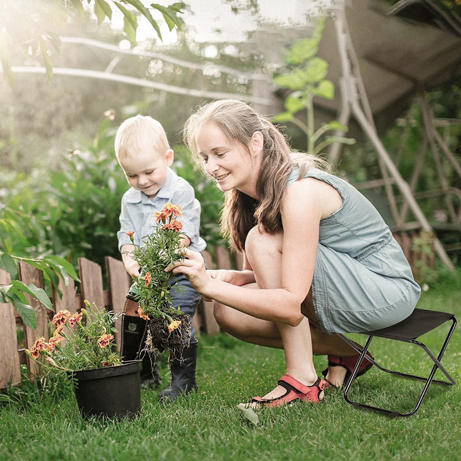 Foldable Camping Stool Portable Travel Chair with a tubular metal frame and a durable fabric seat, isolated on a white background.