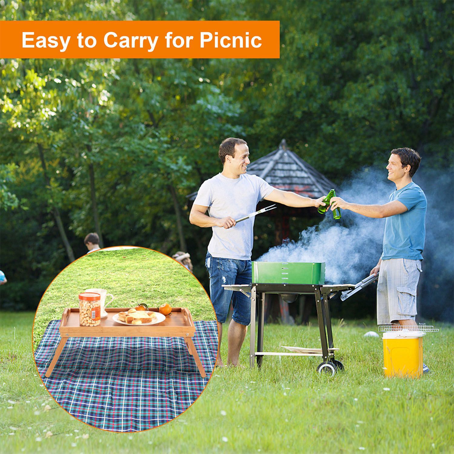 Bamboo Folding Bed Table Breakfast Tray with legs, holding a cup, fruits, a jar of nuts, and a plate with cheese and crackers, on a white background.