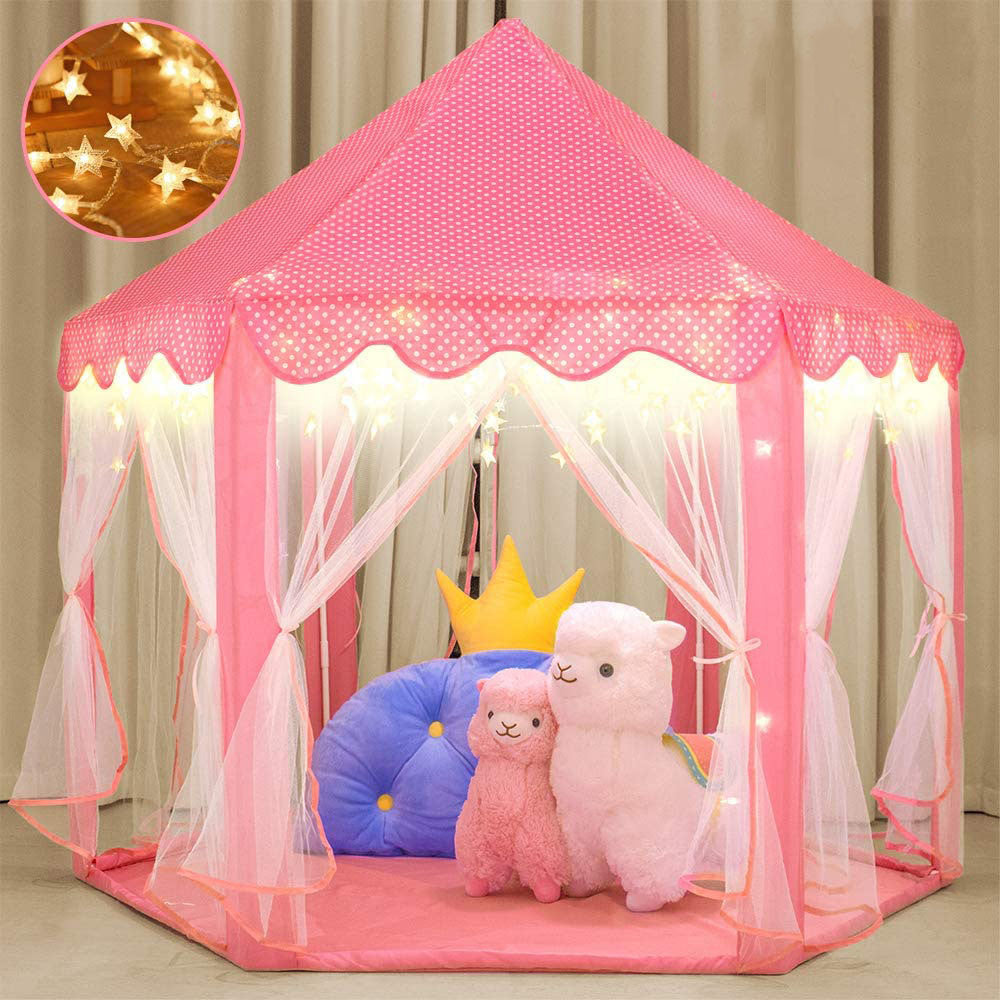 A pink Outdoor Indoor Portable Folding Princess Castle Tent Kids Children Funny Play Fairy House Kids Play Tent with its flap open, displaying several teddy bears inside, illuminated by string lights, with a star-shaped light visible at the top corner.