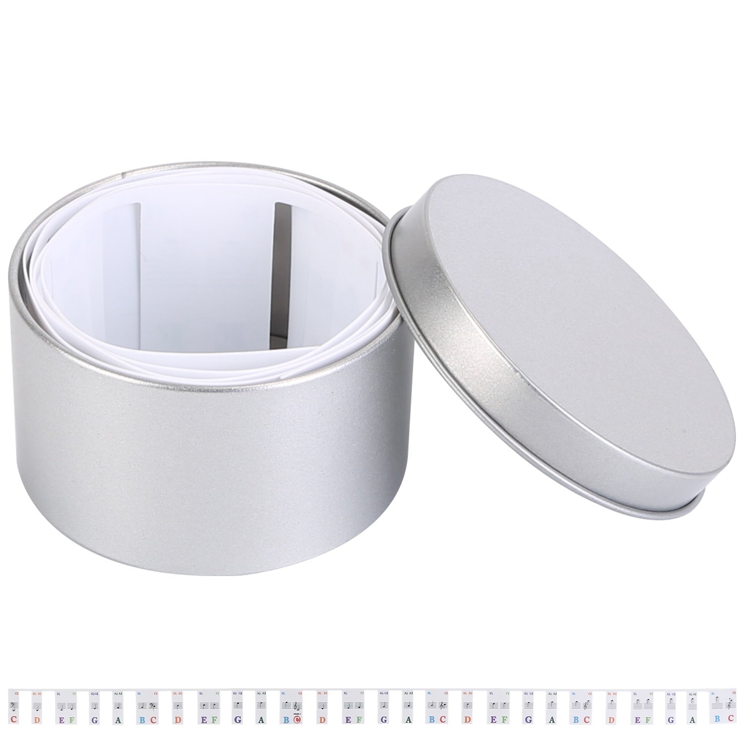 Piano Keyboard Stickers Removable Piano Key Labels PVC Piano Notes Guide without Glue for Beginners Kids with musical notes and corresponding letters, displayed in a loop beside a small round container with a metallic lid.