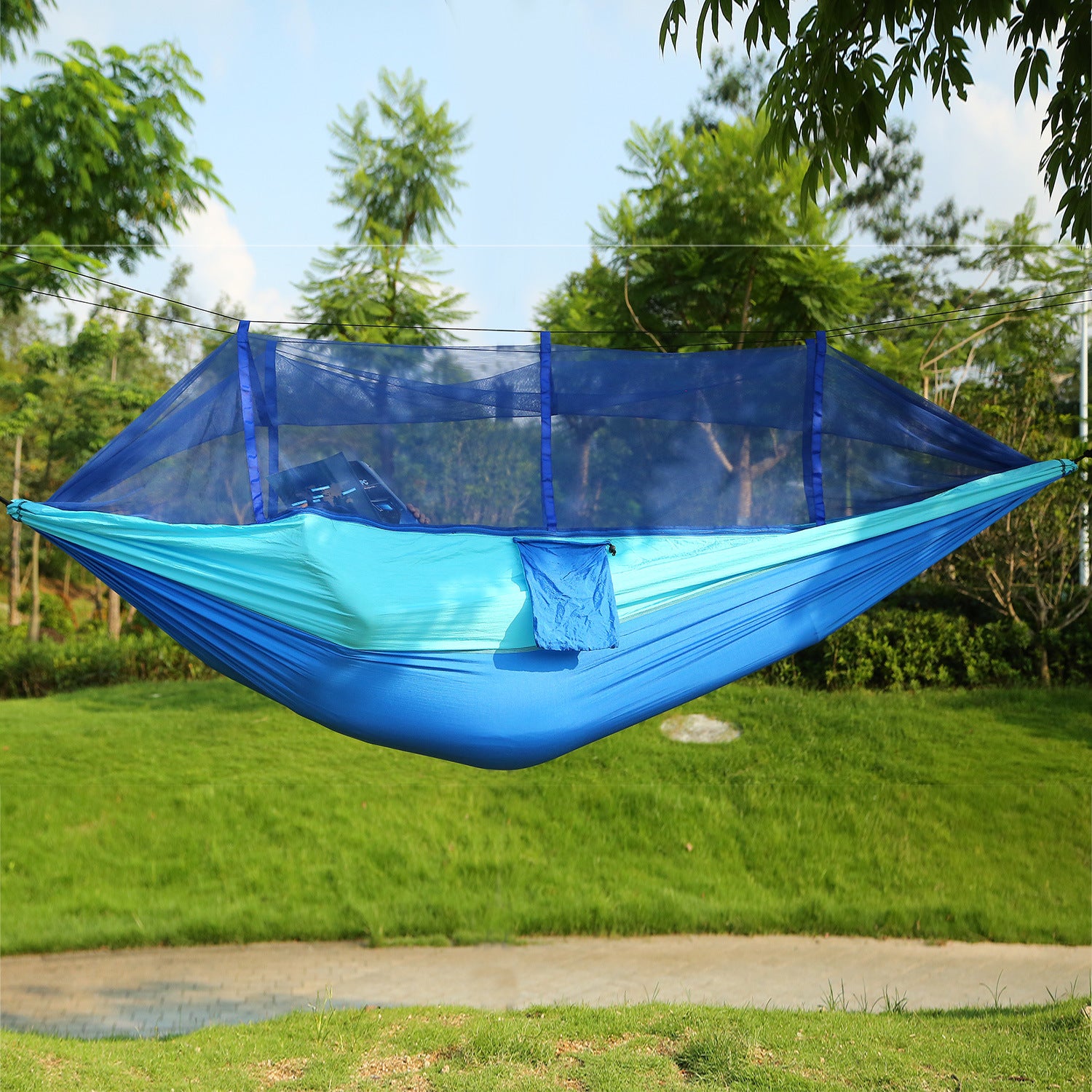 600lbs Load 2 Persons Hammock with Mosquito Net Outdoor Hiking Camping Hommock Portable Nylon Swing Hanging Bed, suspended by ropes on a white background.