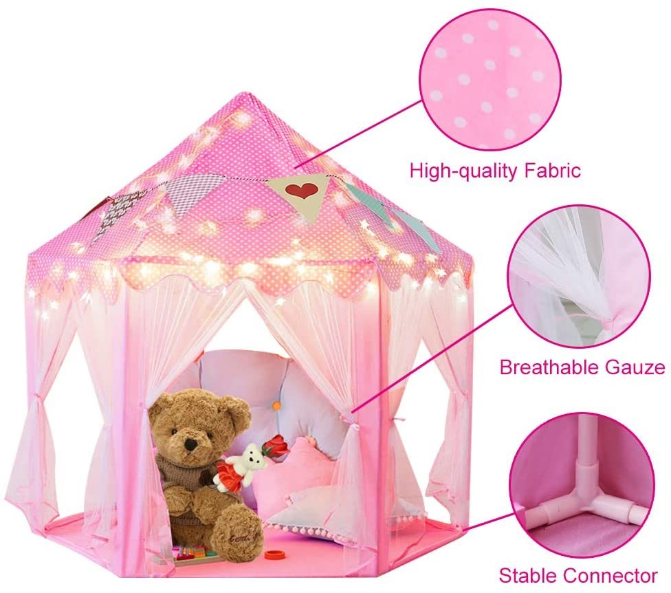 A pink Outdoor Indoor Portable Folding Princess Castle Tent Kids Children Funny Play Fairy House Kids Play Tent with its flap open, displaying several teddy bears inside, illuminated by string lights, with a star-shaped light visible at the top corner.