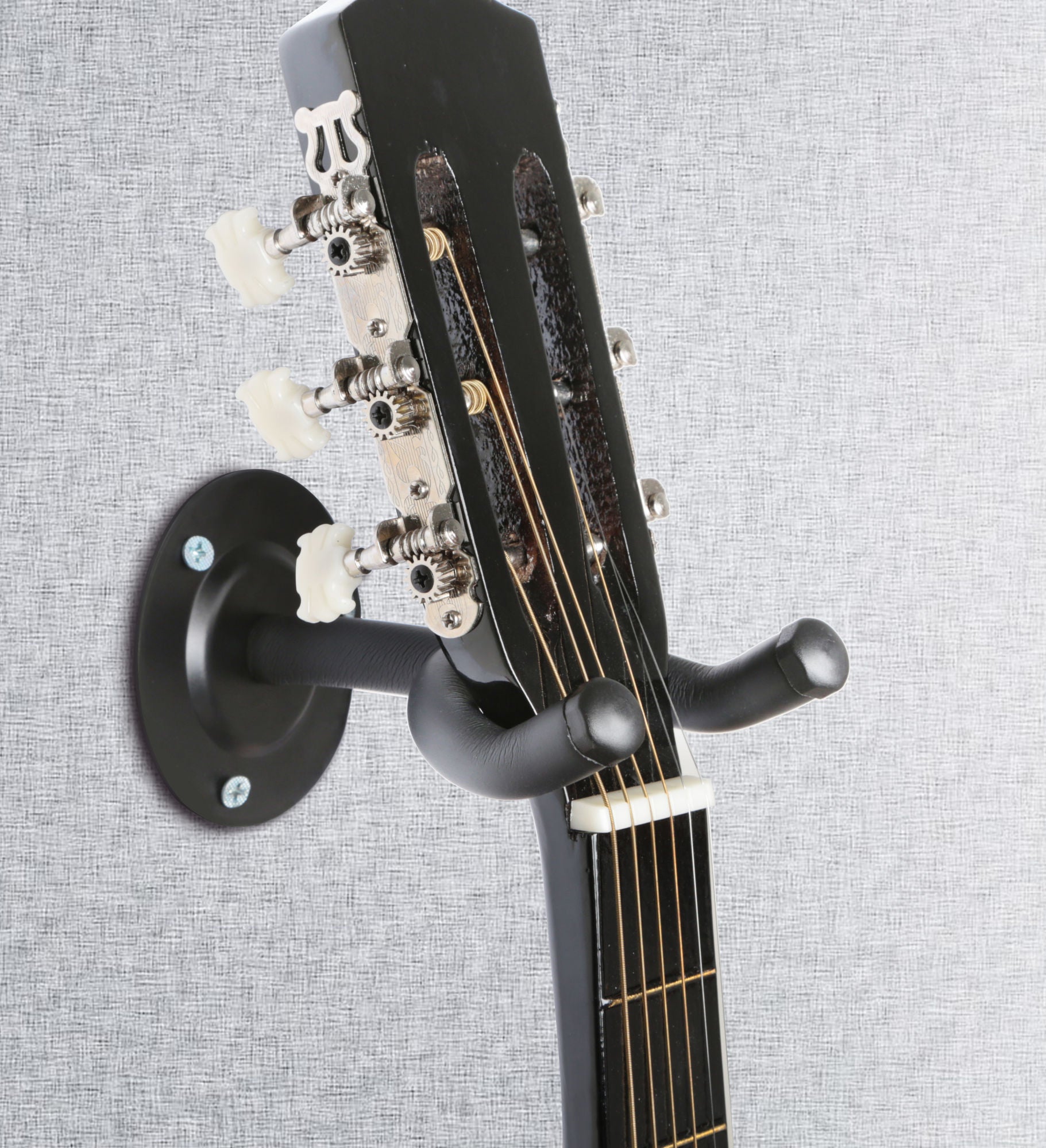 A black Wall Mount Guitar Hanger Padded Steel Guitar Bracket Holder Hook Rack, shown in use holding a guitar, and emphasizing features like guitar protection and durability.