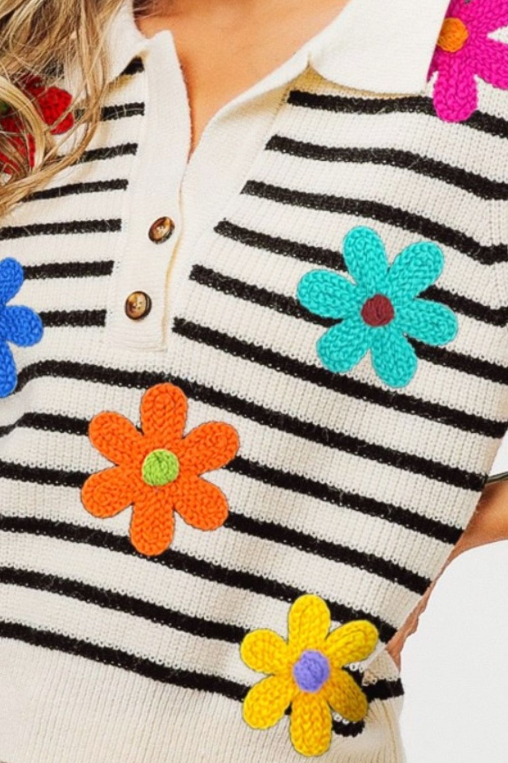 A woman wearing the BiBi Flower Patch Striped Half Button Sweater Vest stands against a plain background.