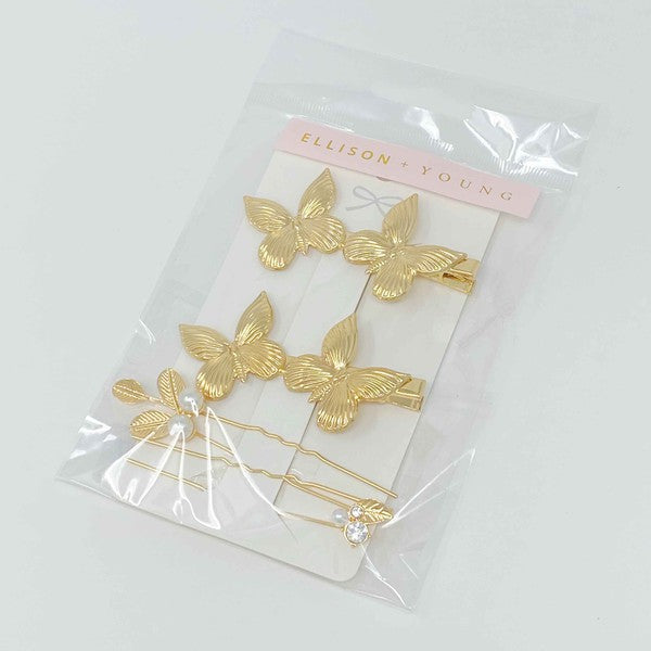 Antique Garden Hair Clip Set butterfly clips and pearl-embellished hair pins on a pink background.
