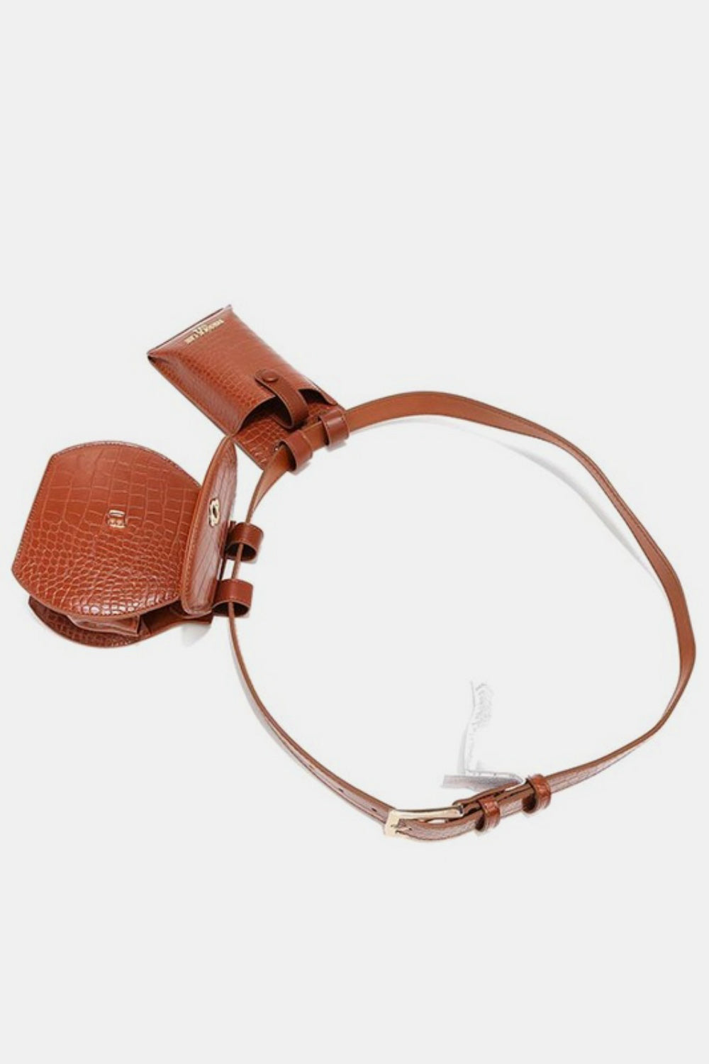 The Nicole Lee USA 2 Piece Texture Belt Bag is a brown vegan leather belt with an attached phone case and small pouch featuring a crocodile skin pattern. The adjustable belt also includes removable pouches for added convenience and style.