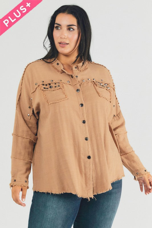 A person with dark hair wearing a Plus Distressed Hem Button Down Oversize Shirt and jeans stands against a light background, embodying casual comfort.